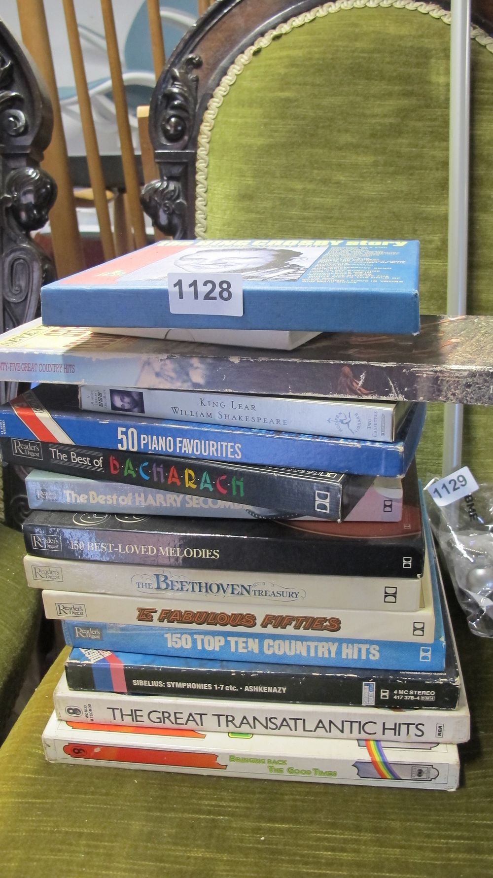 Lot 1128: A Collection of Music and Spoken Word Cassette Box Sets and Media.
