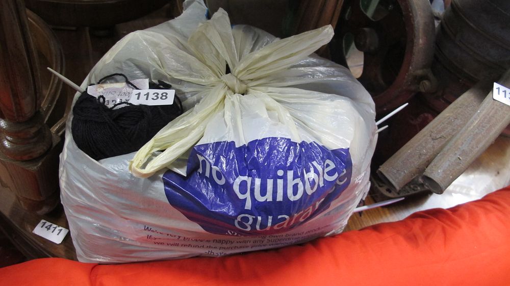 Lot 1138: A Collection of Knitting Supplies and Yarn