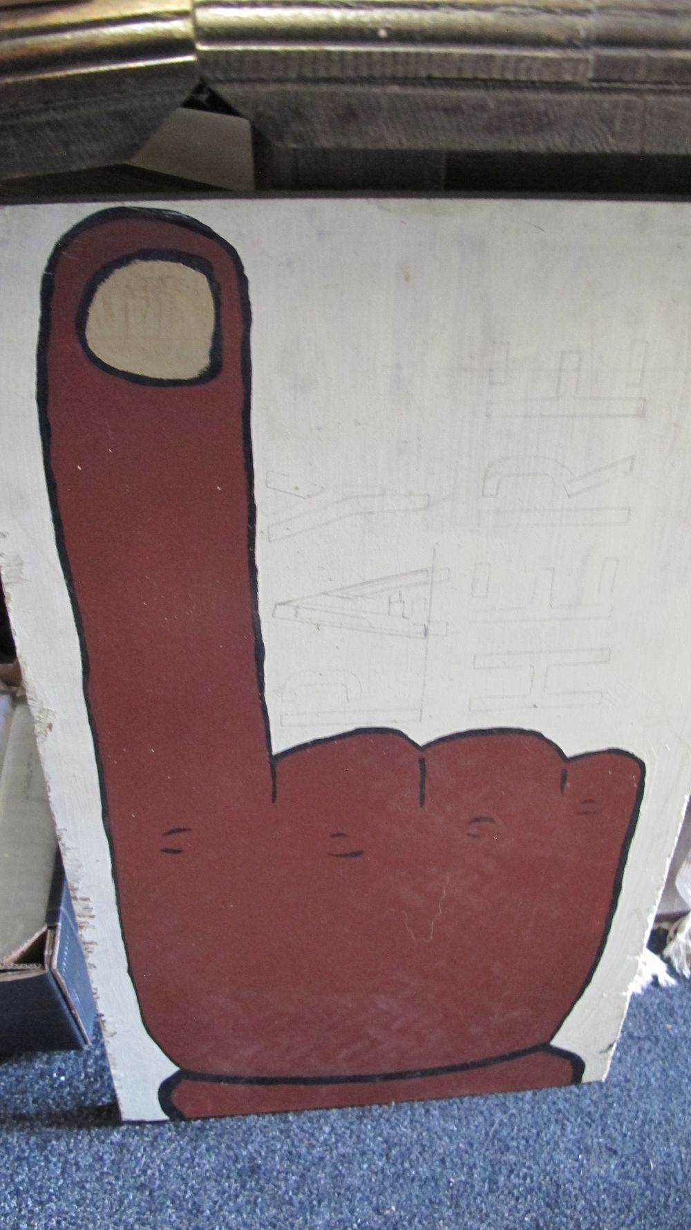 Lot 1157: A Folk Art Painted Plywood Sign Depicting a Hand