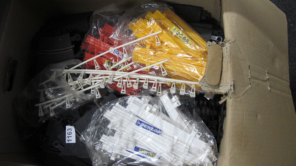 Lot 1163: A Collection of Slot Car Racing Track and Trackside Accessories