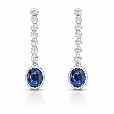 ELEGANT BLUE SAPPHIRE EARRINGS WITH A LINE OF DIAMONDS. Long white gold earrings with 14 
