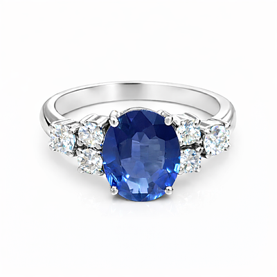 Ring with sapphire and diamonds. WHITE GOLD RING WITH A 3.30 CT NATURAL BLUE SAPPHIRE, POSSIBLY 