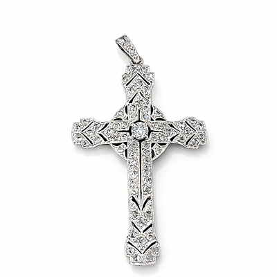 PLATINUM CROSS WITH DIAMONDS. Handcrafted platinum cross from the period with openwork and 