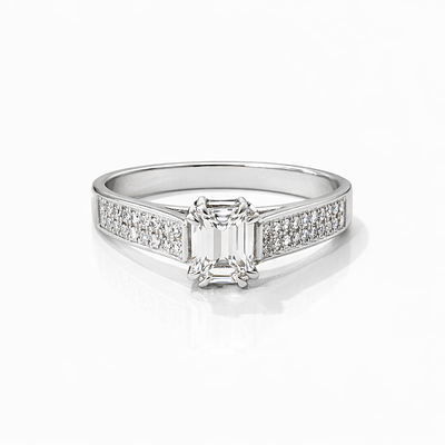 SOLITAIRE RING. WHITE GOLD SOLITAIRE RING WITH AN APPROXIMATELY 1.02CT EMERALD-CUT CENTER 