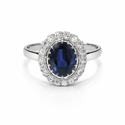 RING WITH SAPPHIRE AND DIAMONDS. 18KT GOLD RING, SET WITH 16 BRILLIANT-CUT DIAMONDS WITH A TOTAL 