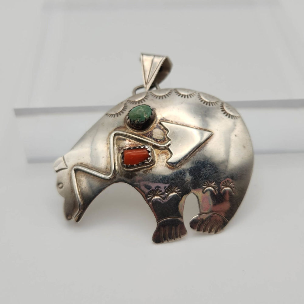 Lot 157: Navajo L Robert SterlingTurquoise/Coral Bear Pendant 8.1g