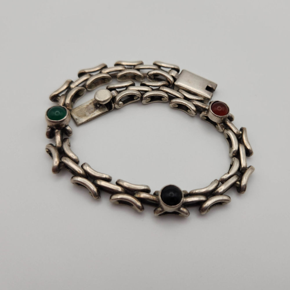 Lot 181: Taxco Sterling Multistone Link Bracelet 25g