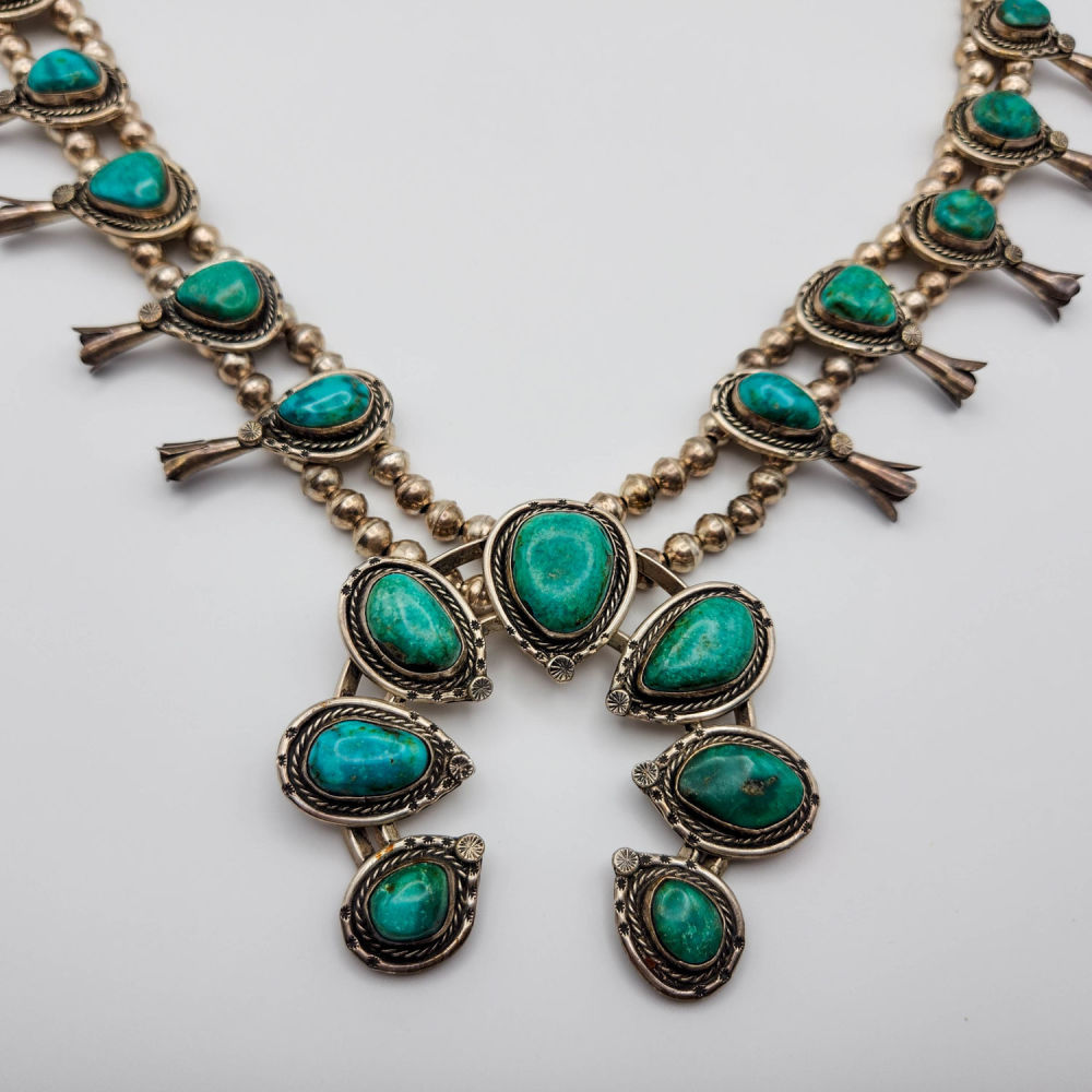 Lot 193: Signed Sterling Turquoise Squash Blossom