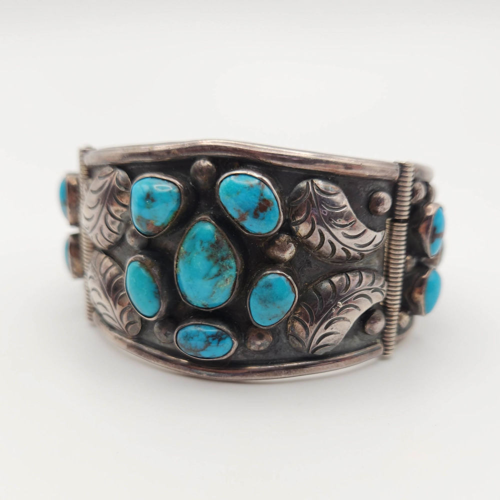 Lot 198: Sterling Turquoise Leaf Panel Bracelet 103.2g