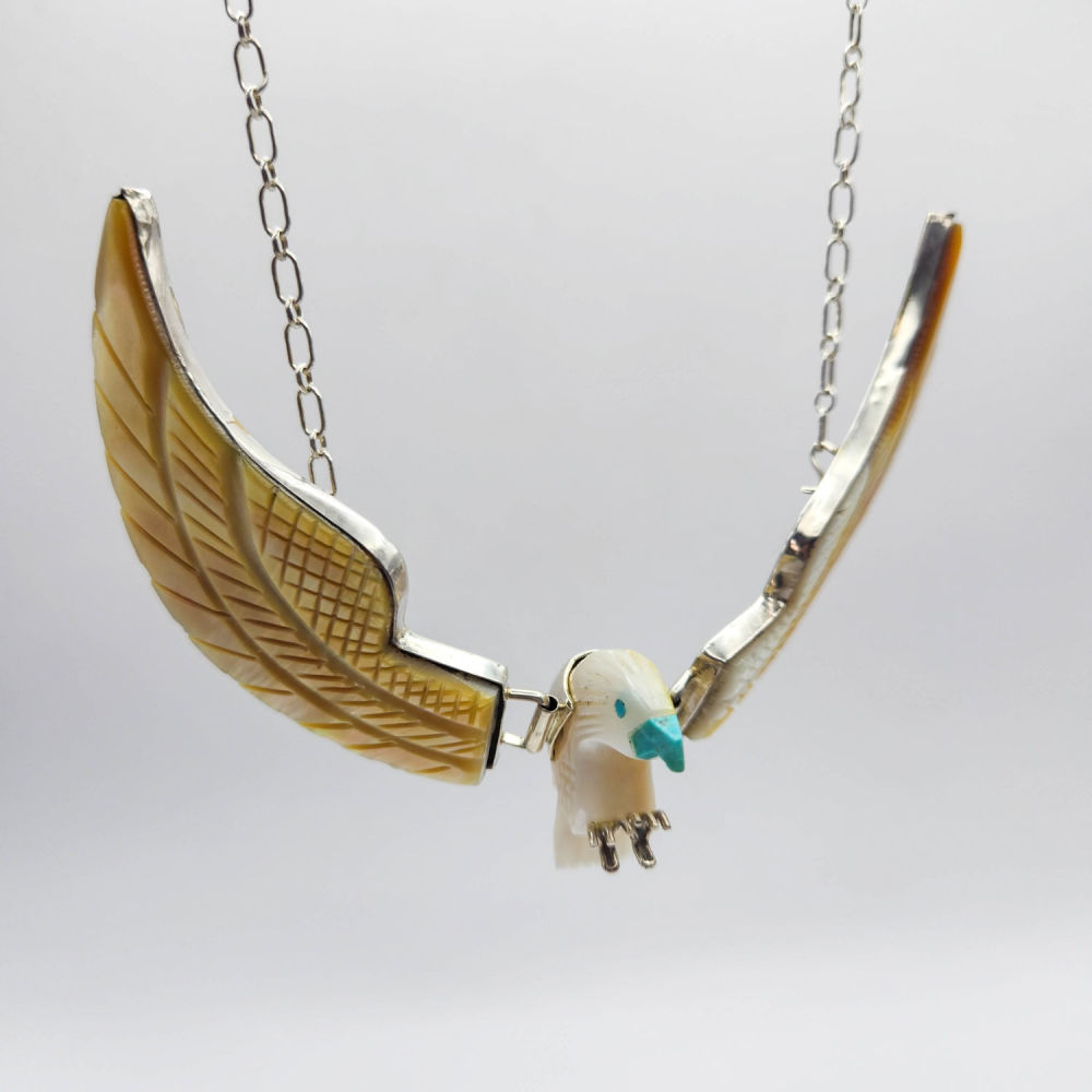 Lot 332: Navajo AB Sterling Mother of Pearl Turquoise Eagle 48g
