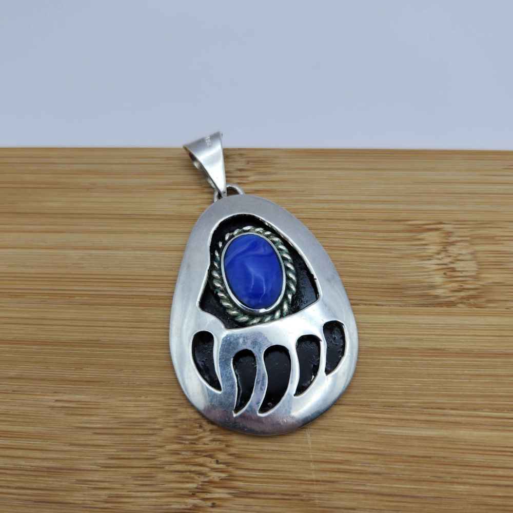 Lot 339: Large Sterling Stone Bear Paw Pendant 23 G