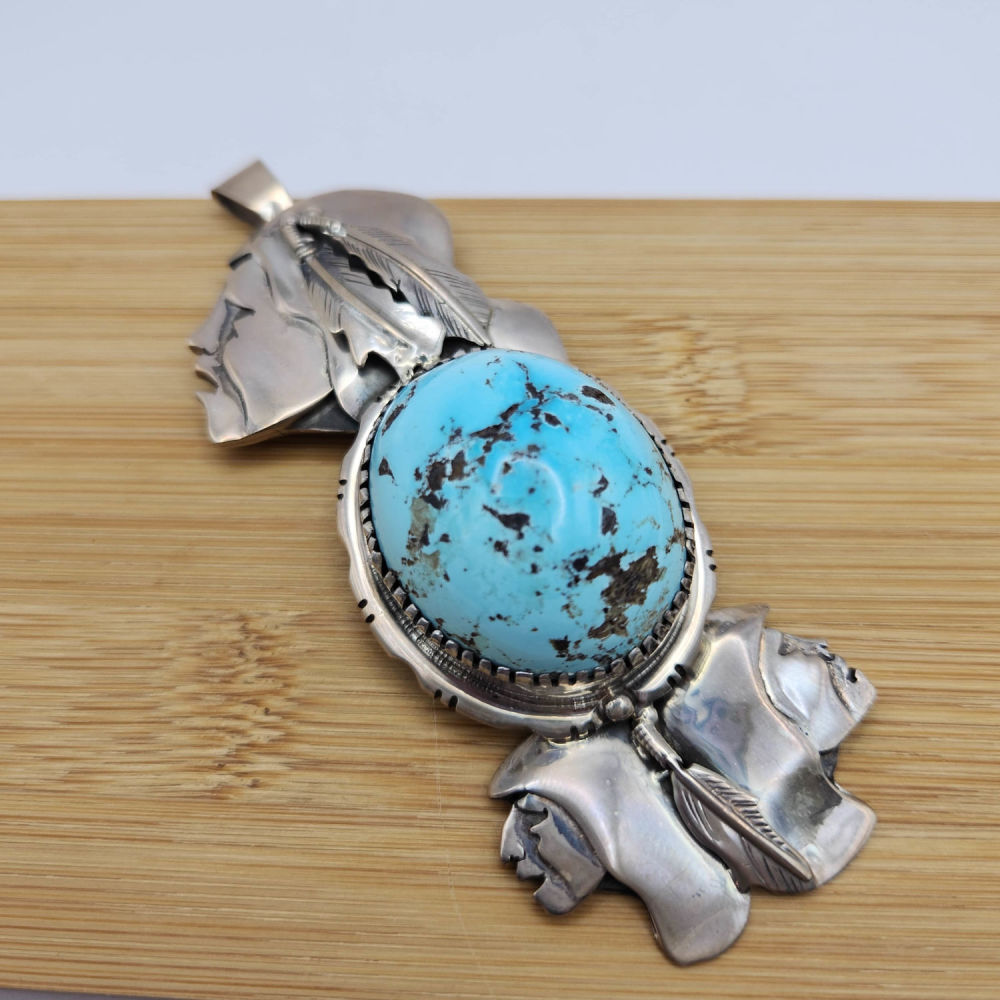 Lot 352: Sterling Dan Nieto Persian Turquoise Pendant 72G