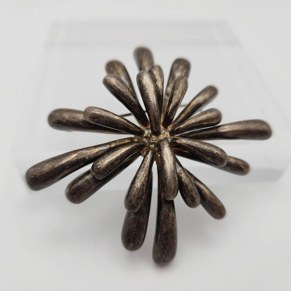 Lot 381: Sterling Signed Fireworks MCM Brooch 34g