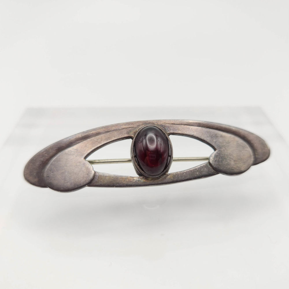 Lot 395: Sterling Nouveau Garnet Scandanavian Brooch 10g