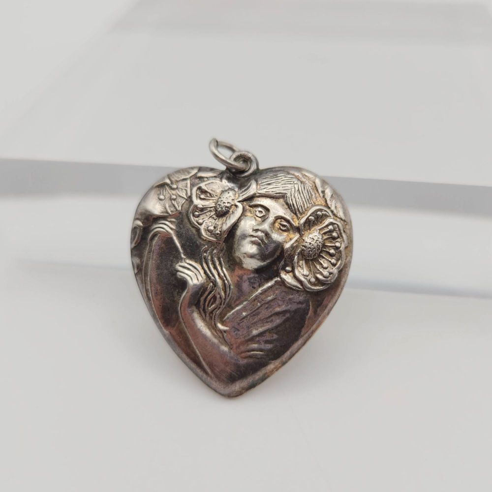 Lot 410: Large Antique Sterling Repousse Charm Puff Heart 4.6g