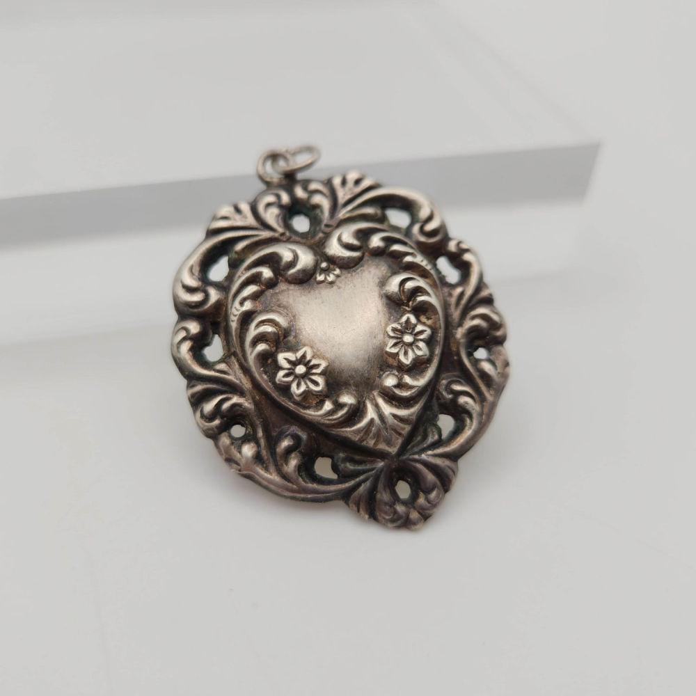 Lot 411: Antique Large Sterling Raised Heart Charm 7g