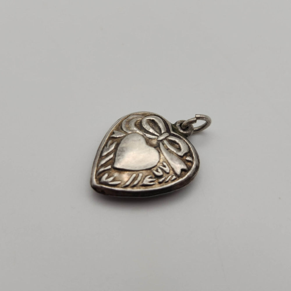 Lot 418: Antique Sterling Puffy Heart Charm 2.1g