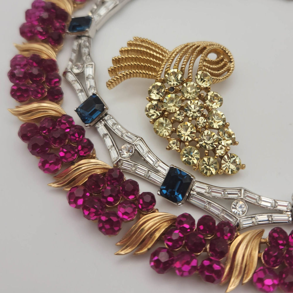 Lot 424: Crown Trifari Ruby Red Necklace Sappire Blue Necklace and Brooch