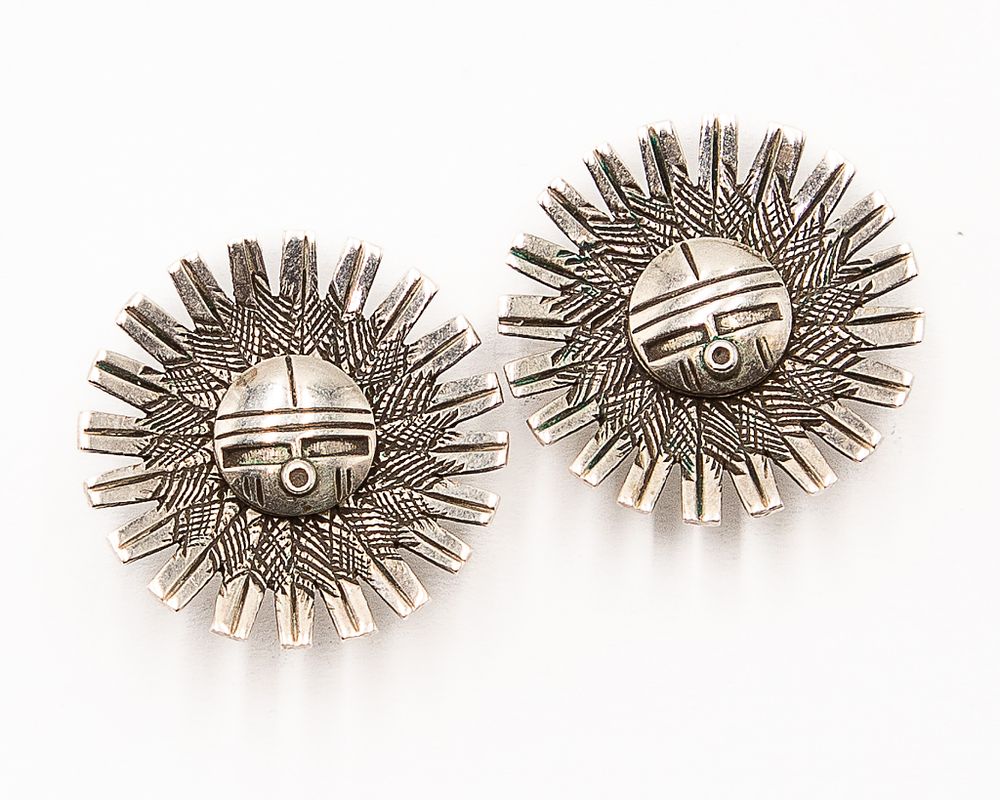 Lot 168: Nelson Morton Navajo Sterling Sun God Earrings