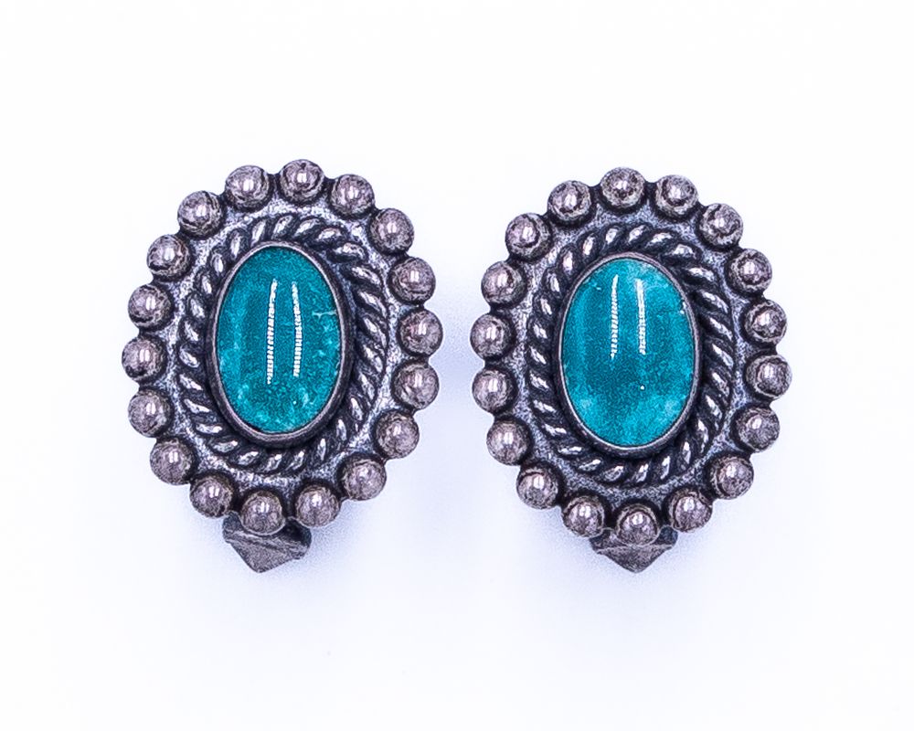 Lot 428: Vintage Navajo Turquoise Sterling Cuff Links