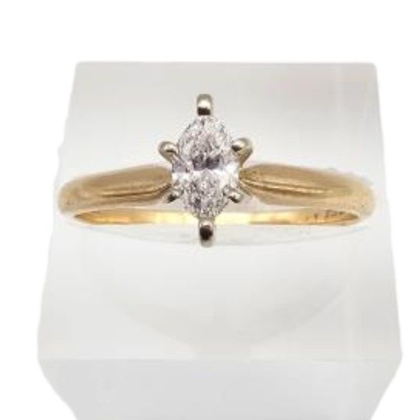 Lot 469: Magic Glo Solitaire Diamond 14K Gold Engagement Ring Sz. 8.5 2.4 G Approximately 0.36 TCW