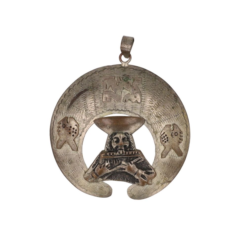 Lot 255: Ecuador Alpaca Silver Flute Player Fish Pendant