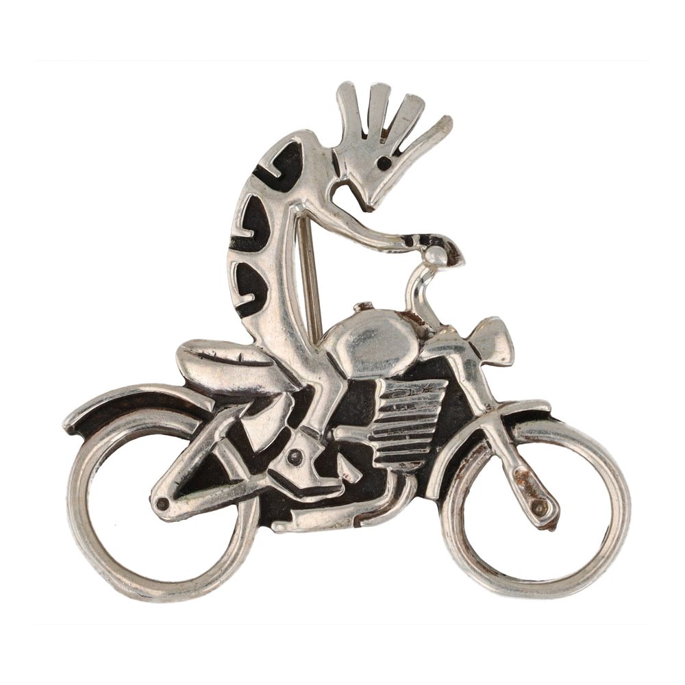 Lot 388: Sterling Kokapeli Motorcycle Rider Brooch