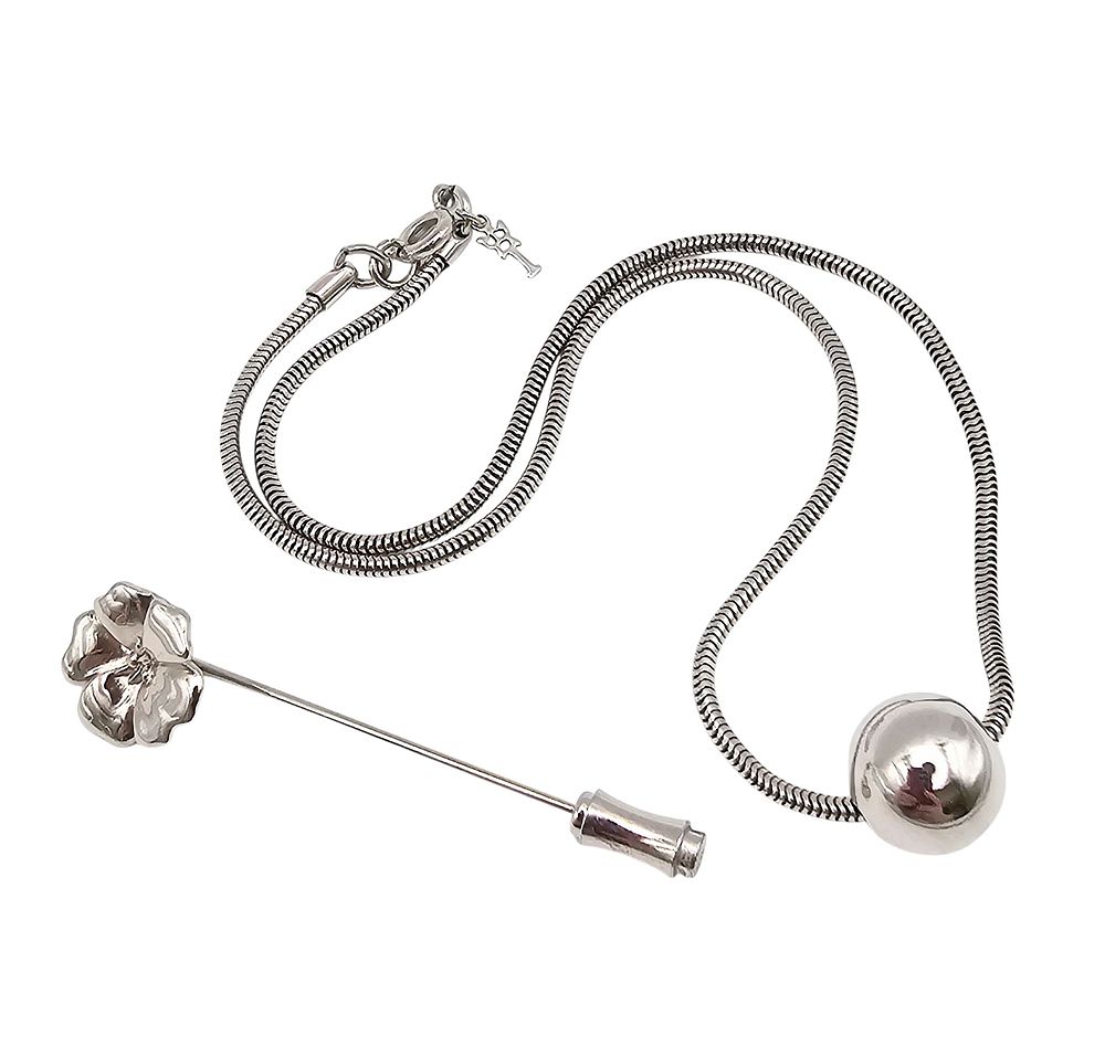 Lot 297: Trifari Lot Silver Tone Necklace Lapel Pin