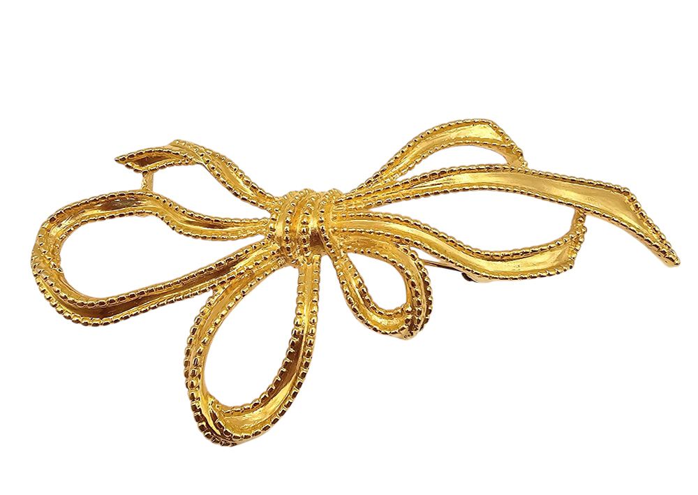 Lot 342: Trifari 1970-80's Gold Tone Bow Brooch