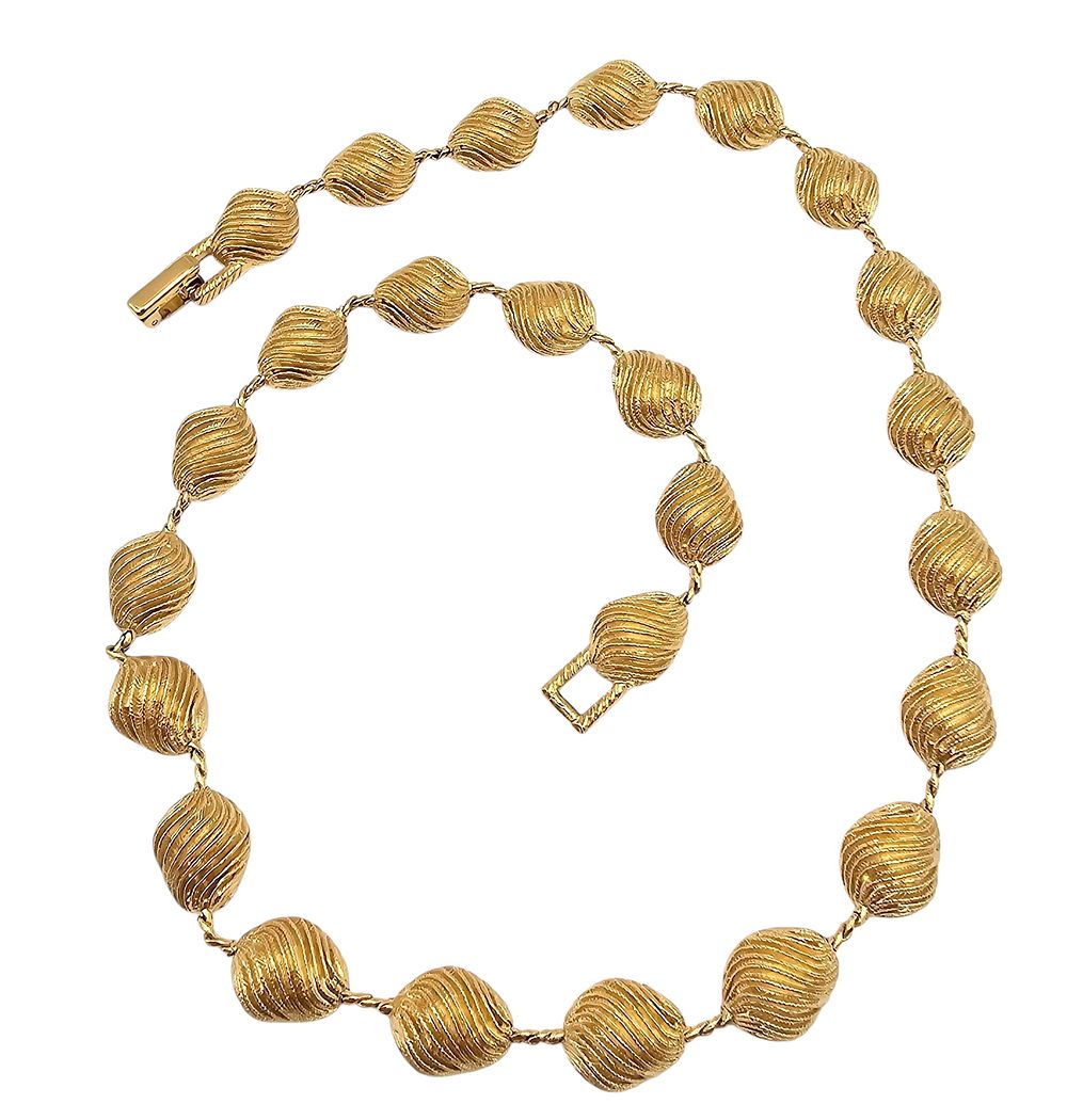 Lot 395: Crown Trifari Gold Tone Ribbed Shell Necklace