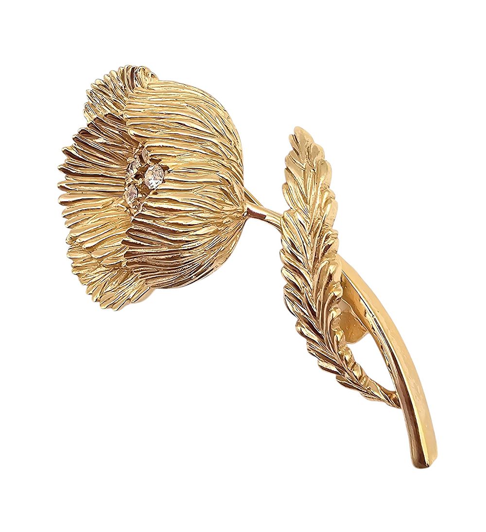 Lot 410: Crown Trifari Rhinestone Gold Tone Floral Brooch