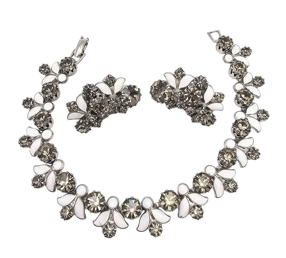 Lot 472: Weiss Vintage Smoky Rhinestone White Enamel Silver Tone Bracelet Earrings Set