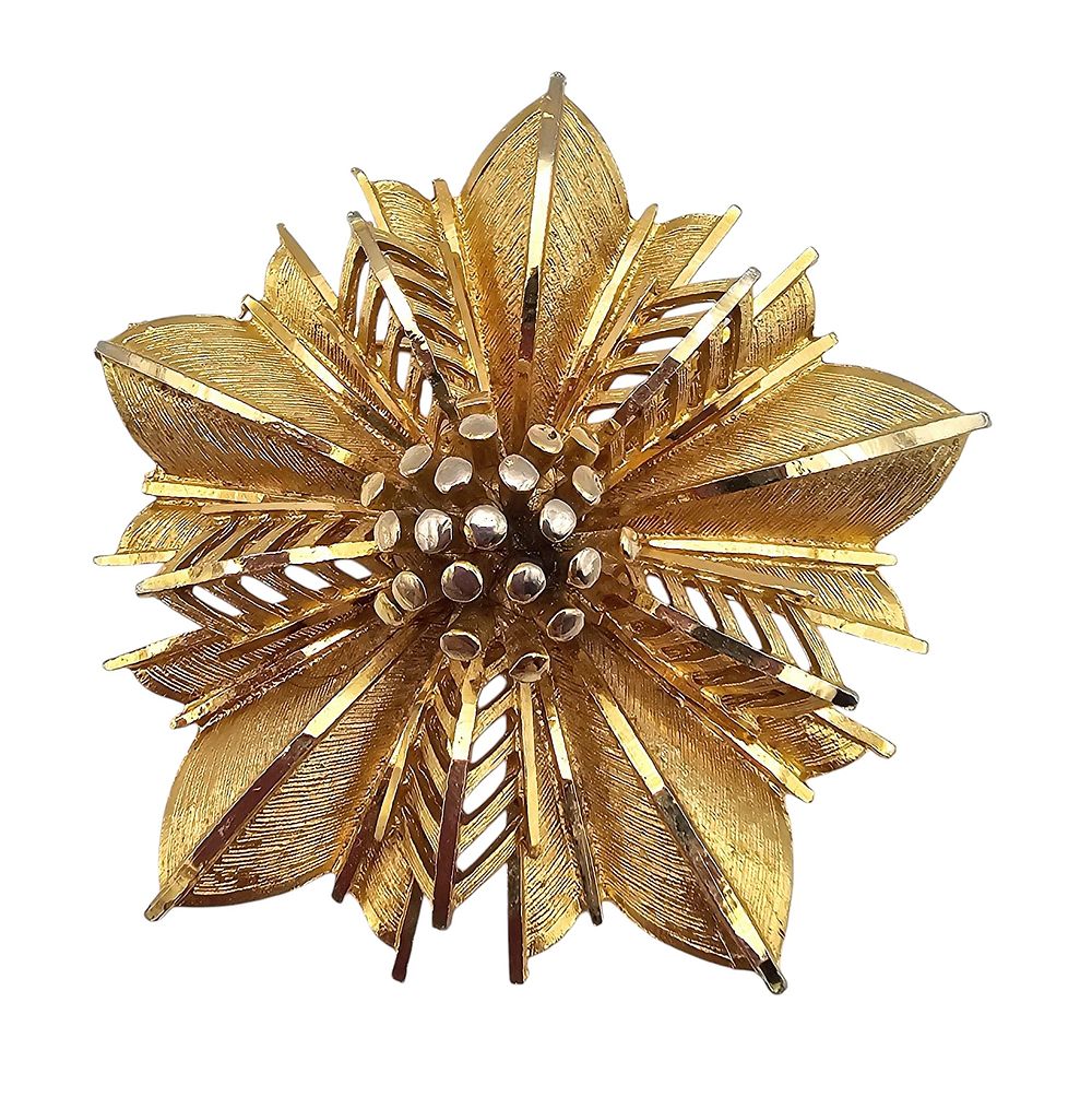 Lot 525: Coro Gold Tone Textured Open Work Flower Brooch