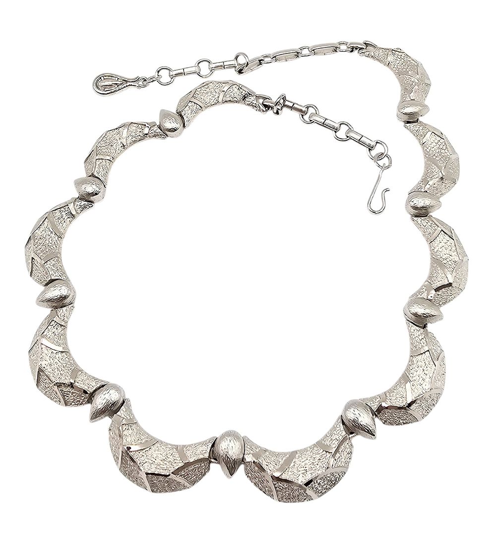 Lot 546: Coro Textured Silver Tone Wave Bib Necklace