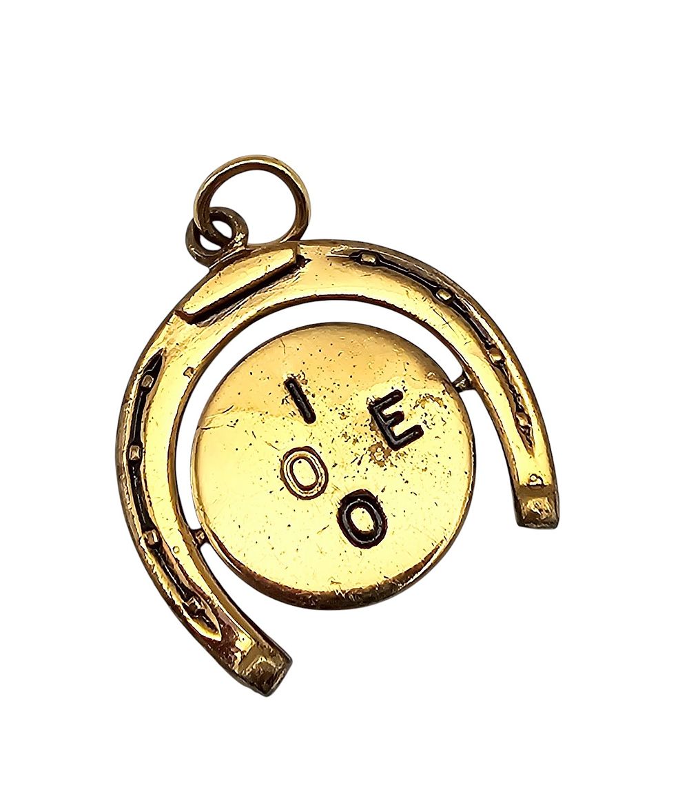 Lot 552: Pegasus Coro Gold Tone Lucky I Love You Charm