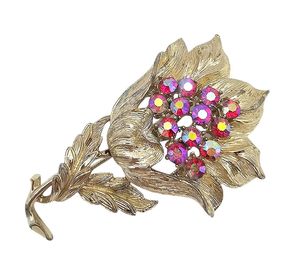 Lot 556: Pegasus Coro Iridescent Rhinestone Gold Tone Flower Brooch