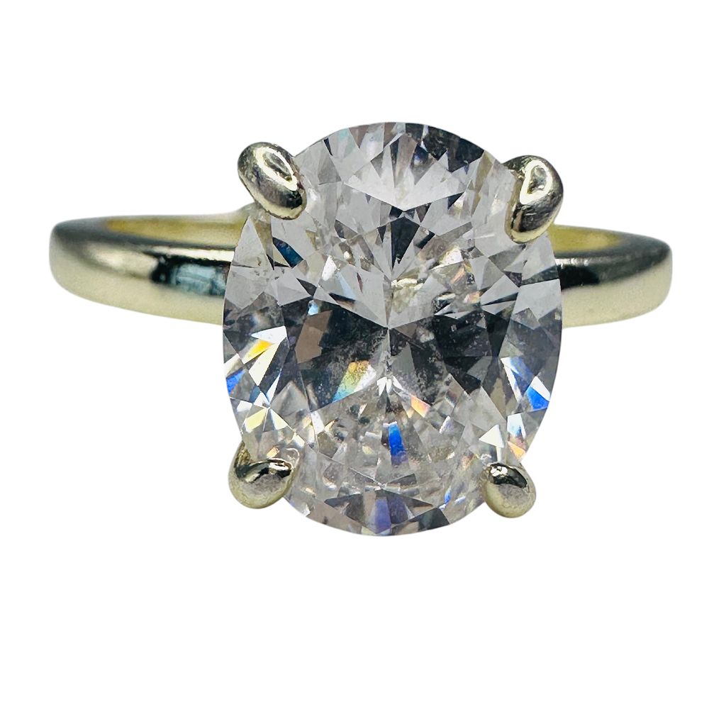 Lot 243: RHINESTONE Sterling Silver Gold Colored Solitaire Setting Engagement Ring. Size 6. 3.28 G.