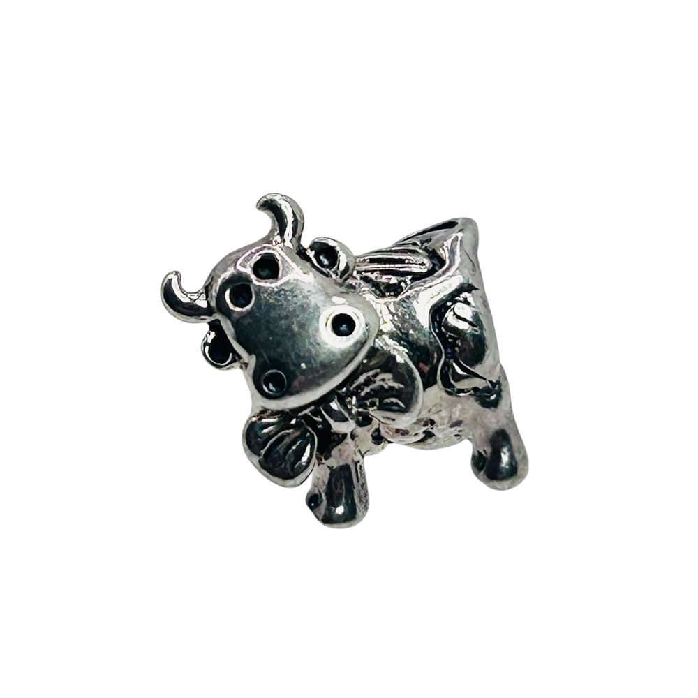 Lot 453: Sterling Silver Cow With Bowtie Pendant. 2.25 G.