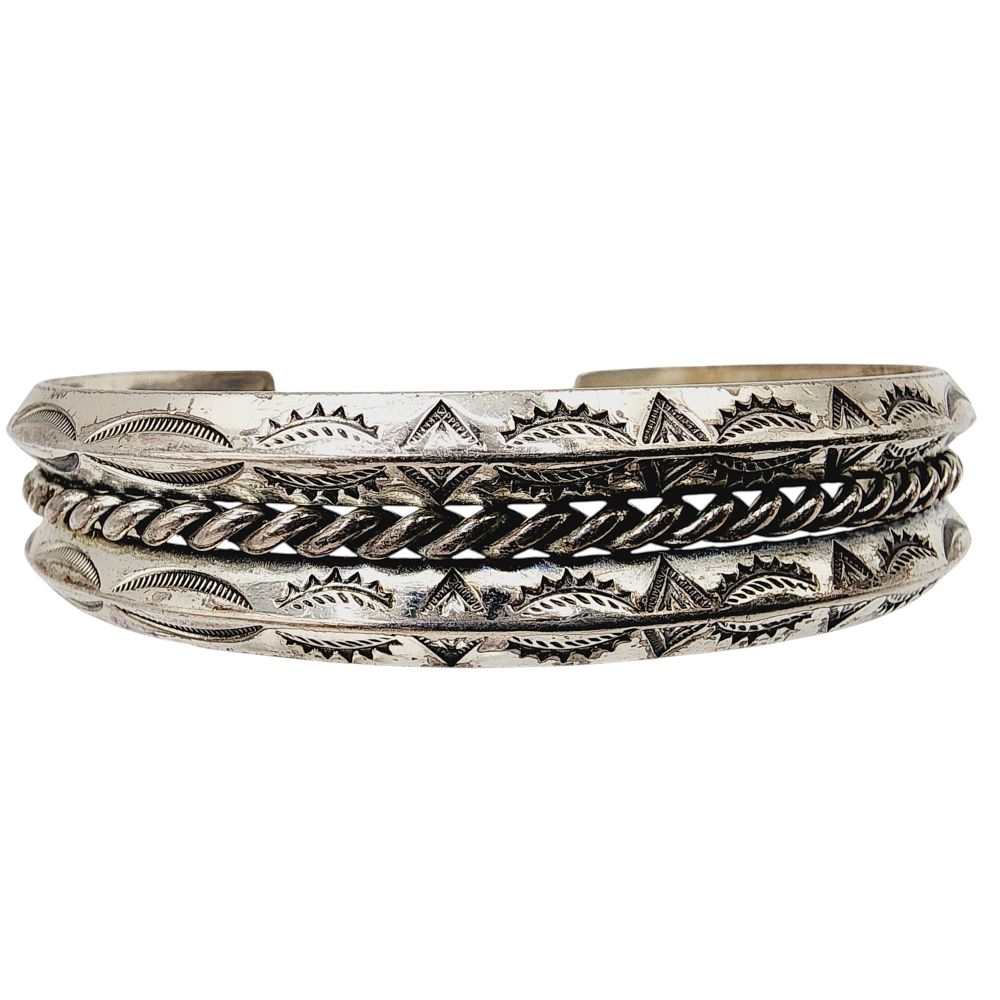 Lot 279: Sterling Vintage Navajo Handstamped Carinated Twist Cuff