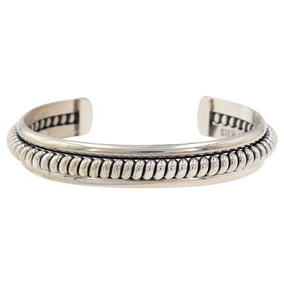 Caroline Tsosie Navajo Sterling Silver Bracelet. A Navajo sterling silver cuff bracelet by 