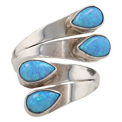 Thomas Yazzie Navajo Sterling Silver Four-Stone Blue Opal Adjustable Ring. A Thomas Yazzie 
