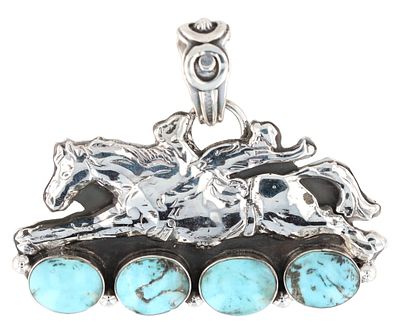 Evangeline Perry Navajo Sterling Silver Kingman Turquoise Riders Pendant. A sterling silver 