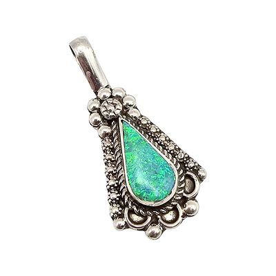Yannette Yatsa Zuni Sterling Opal Pendant. A handmade sterling silver opal pendant crafted by 