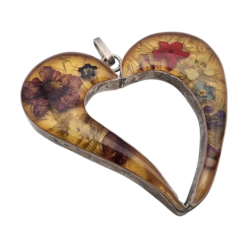 Lot 322: Vintage Sterling Flower Resin Heart Pendant