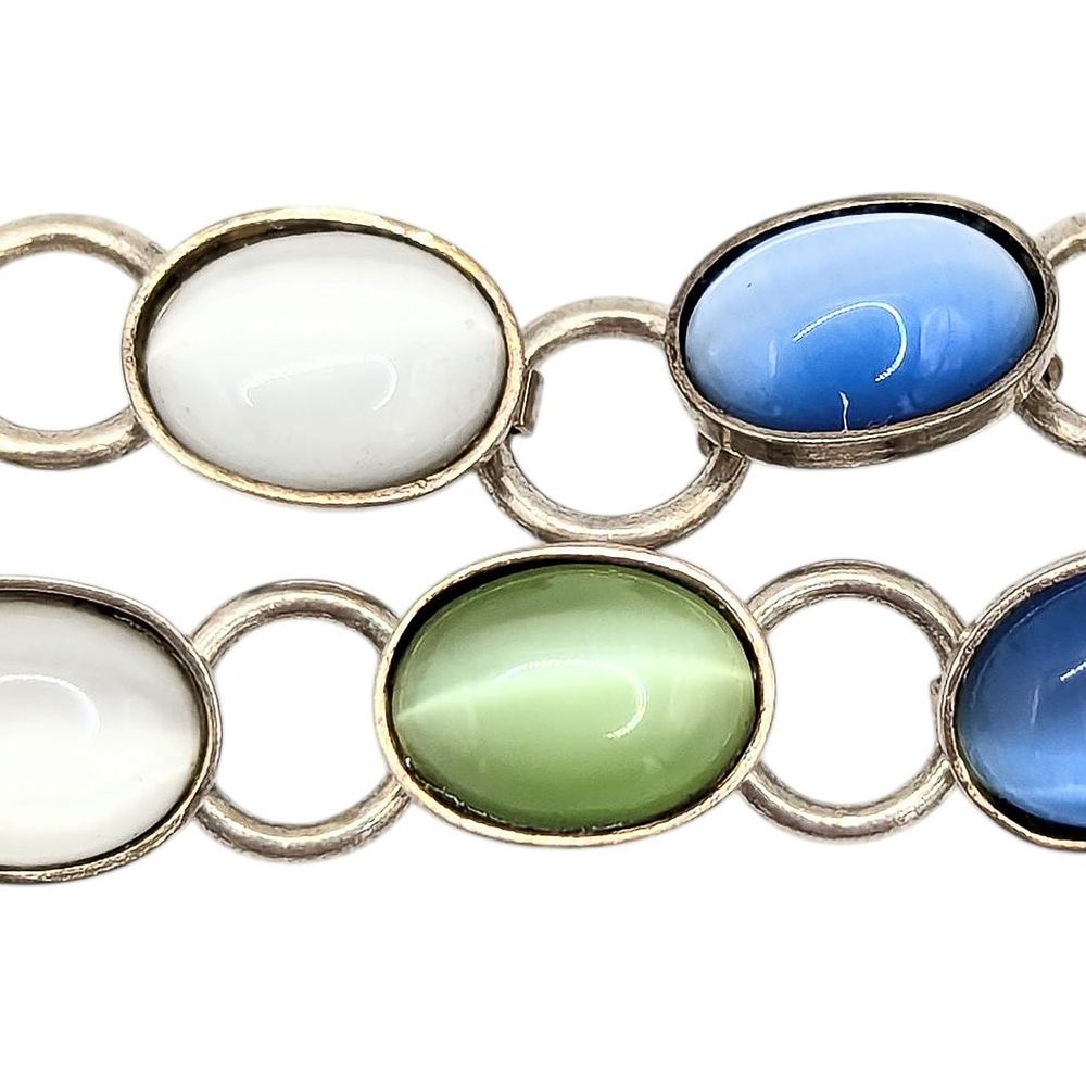 Lot 199: Sterling Blue And Green Cat Eye Glass Bracelet 10.5g