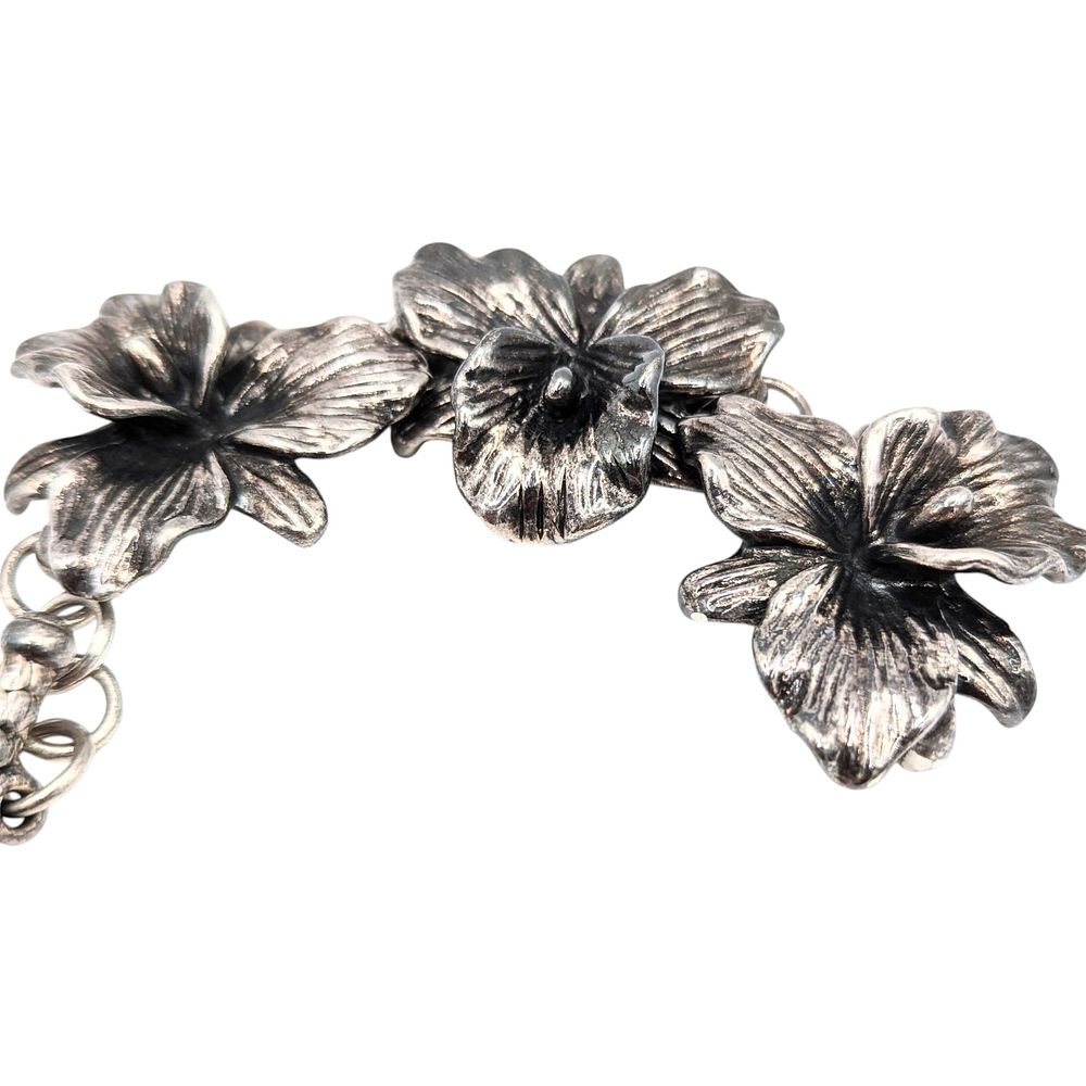 Lot 213: Sterling Hollow Orchid Blossom Bracelet 27.3g