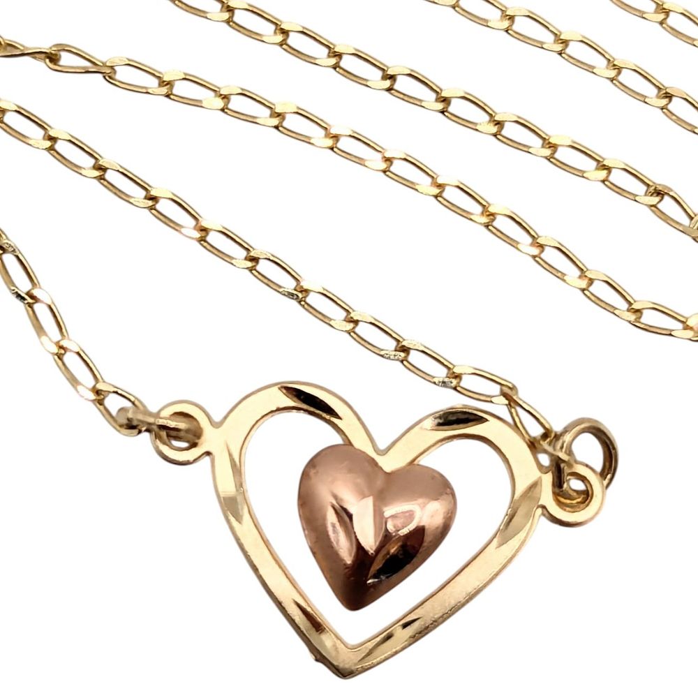 Lot 407: 14K Yellow and Rose Gold Heart Charm Bracelet 1.03g