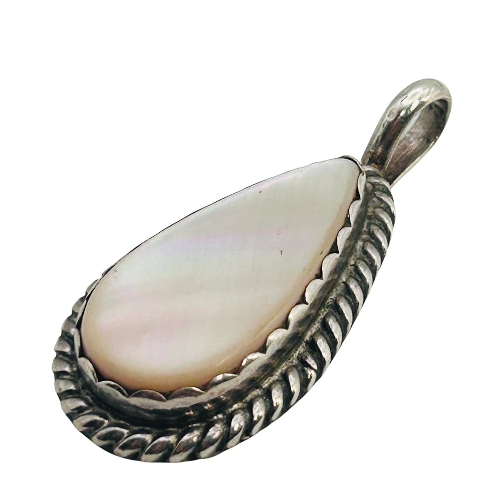 Lot 445: Navajo Signed TT Sterling Mother-of-pearl Teardrop Pendant