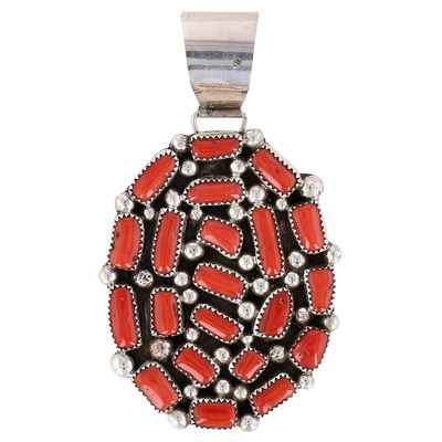 Richardson's Trading Post Kenneth Jones Navajo Sterling Natural Coral Pendant. Presented in 