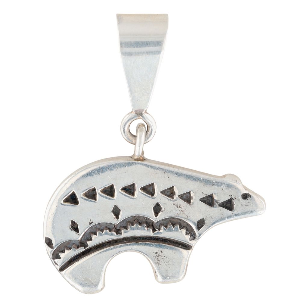 Lot 234: Norman Woody Navajo Sterling Reversible Bear Pendant